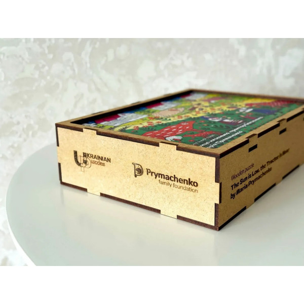 Пазл дерев`яний UkrainianPuzzles Сонце низенько, трактор близенько Марія Примаченко
