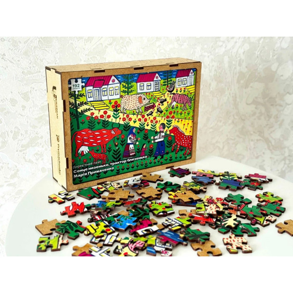 Пазл дерев`яний UkrainianPuzzles Сонце низенько, трактор близенько Марія Примаченко